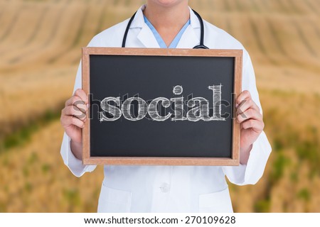 The word social and doctor showing little blackboard against rural fields