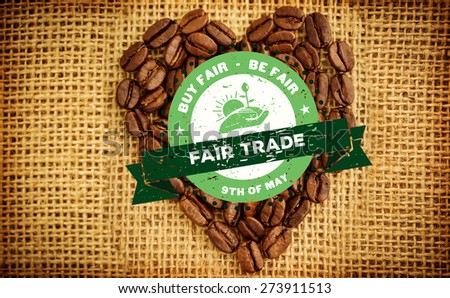 Fair Trade graphic against heart made from roasted coffee beans