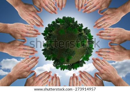 Circle of hands against cloudy sky with sunshine