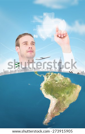 Cheerful businessman pointing with his finger against blue sky