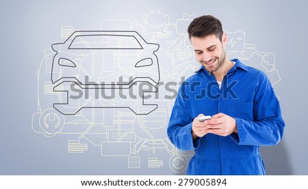 Male mechanic text messaging through mobile phone against grey vignette
