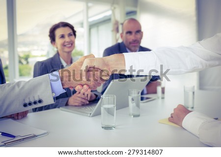 Business people shaking hands at interview in the office