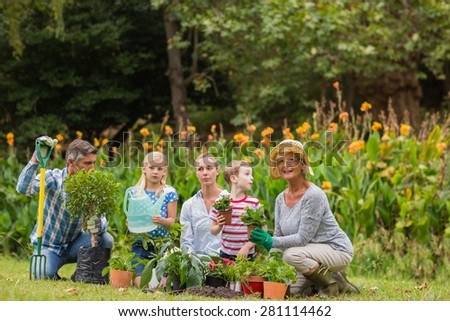 Happy family gardening on a sunny day