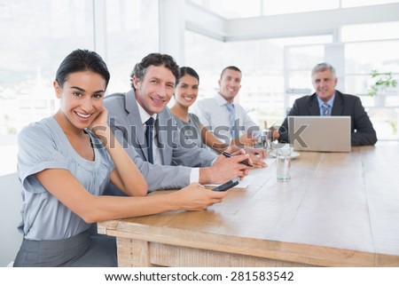 Smiling business team on a meeting in the office
