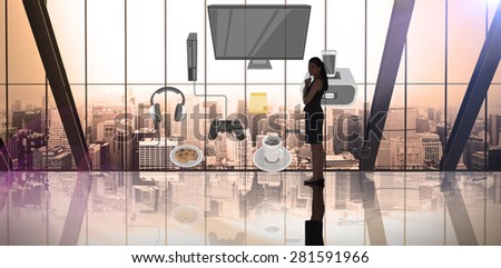 Thinking businesswoman against room with large window looking on city