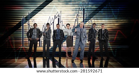 Business people against stocks and shares on black background