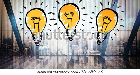 Light bulb against room with large window looking on city