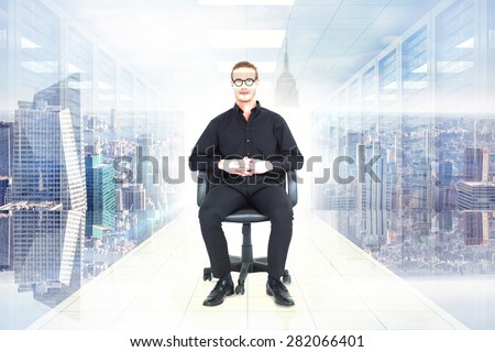 Stern businessman sitting on an office chair against digitally generated server room with towers