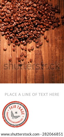 Fair Trade graphic against coffee beans