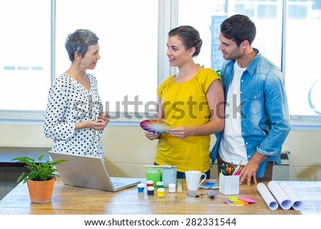 Casual business team having meeting in the office