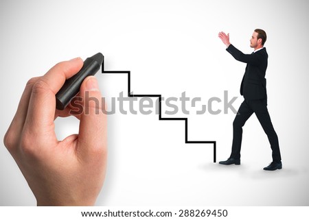 Composite image of smiling businessman with his hands up