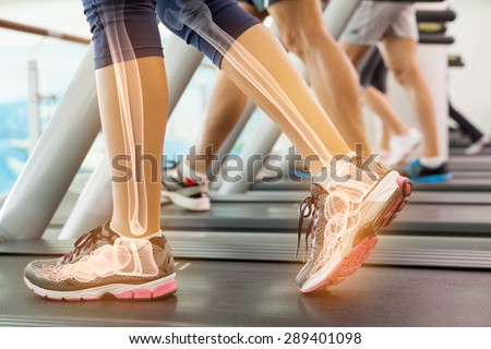 Digital composite of Highlighted ankle of woman on treadmill