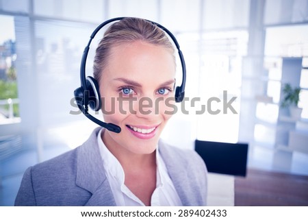 Businesswoman taking calls in the office