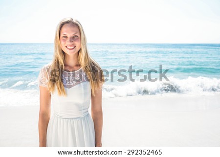 happy woman smiling at the beach