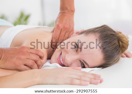 Physiotherapist doing shoulder massage in the medical office