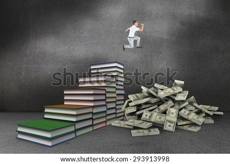 Geeky happy businessman running mid air against steps made from books in grey room
