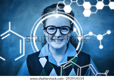 Science graphic against portrait of cute little girl smiling in classroom