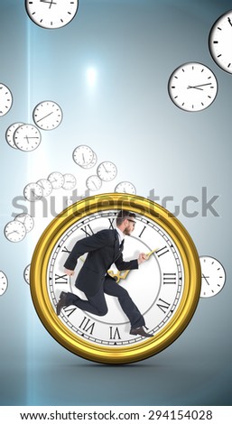 Geeky young businessman running mid air against digitally generated floating clock pattern