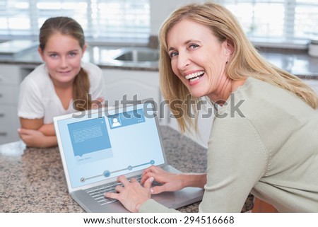 Website interface against happy mother using laptop with her daughter