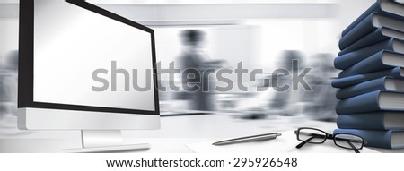 Computer screen against business people listening during meeting