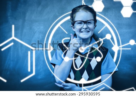 Science graphic against portrait of cute little girl gesturing thumbs up