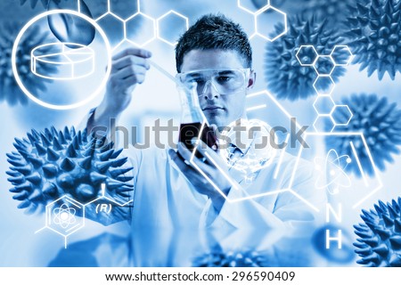 Science graphic against serious chemist looking at beaker with blood