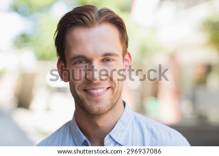 Portrait of a handsome smiling man looking at the camera