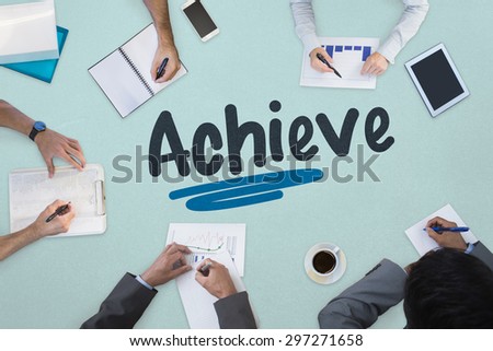The word achieve against business meeting