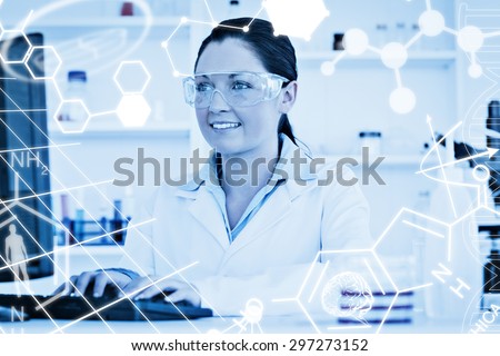 Science graphic against cute scientist typing a report with her computer