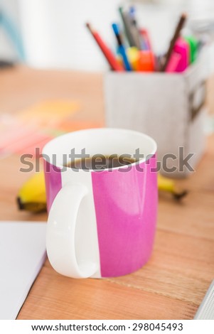 Young business people desk with a coffee mug