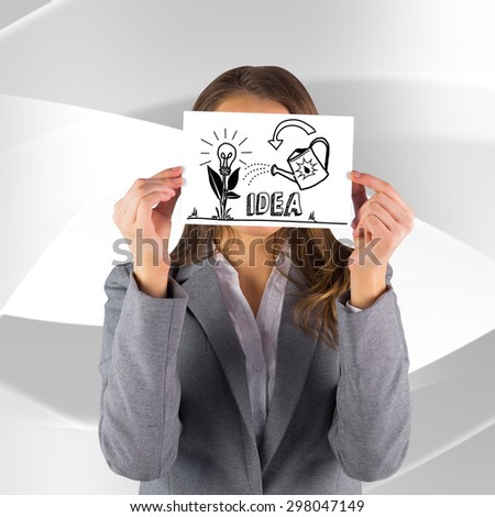 Businesswoman showing a card against white angular design