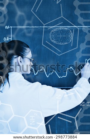 Science graphic against scientist drawing a graph on the blackboard