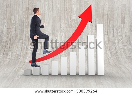 Businessman walking with his leg up against curved wooden room
