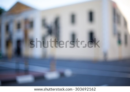 A blurry urban street scene