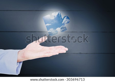 Handsome businessman gesturing with hands against blue sky Handsome businessman gesturing with hands on a white background