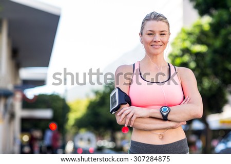 Portrait of beautiful athlete smiling on a beautiful day