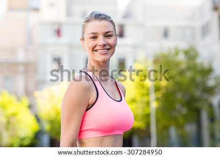 Portrait of beautiful athlete smiling on a beautiful day