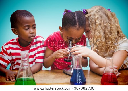 Cute pupil looking through microscope against blue vignette background