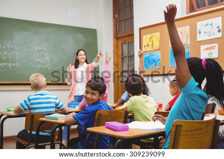 Teacher gettting an answer from a student at the elementary school