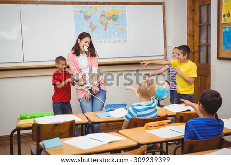 Students tying the teacher up at the elementary school
