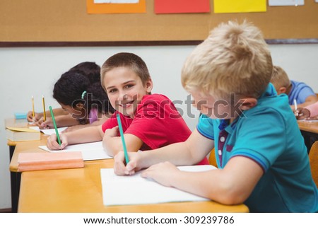 Pupils working at school work at the elementary school
