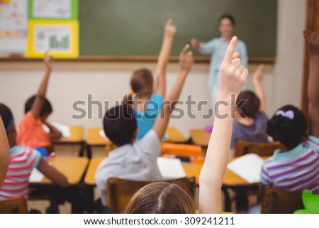 Teacher teaching a lesson in class at the elementary school ストックフォト © 