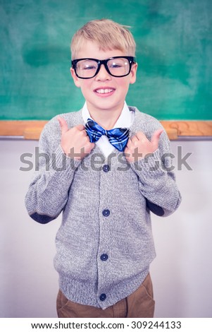 Smart student wearing bow tie and glasses at the elementary school