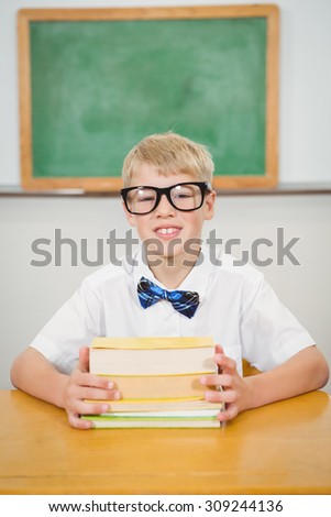 Smart student wearing glasses at the elementary school