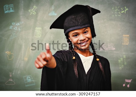 School subjects doodles against girl in graduation robe gesturing thumbs up