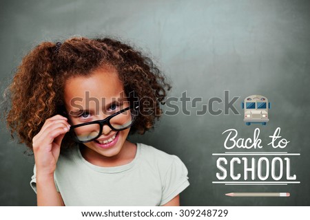 Cute pupil tilting glasses against back to school