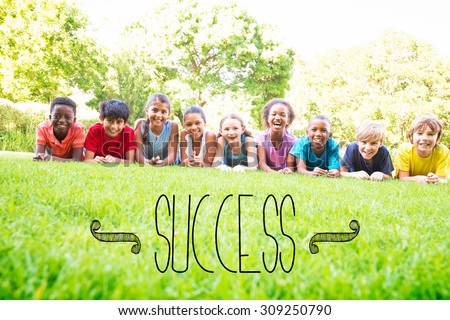 The word success against happy friends in the park