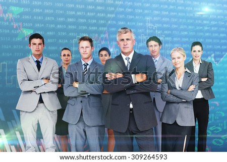 Business team standing arms crossed against stocks and shares