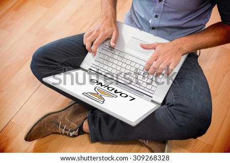 loading doodle against young creative businessman working on laptop