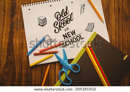 school doodles against notepad on student desk